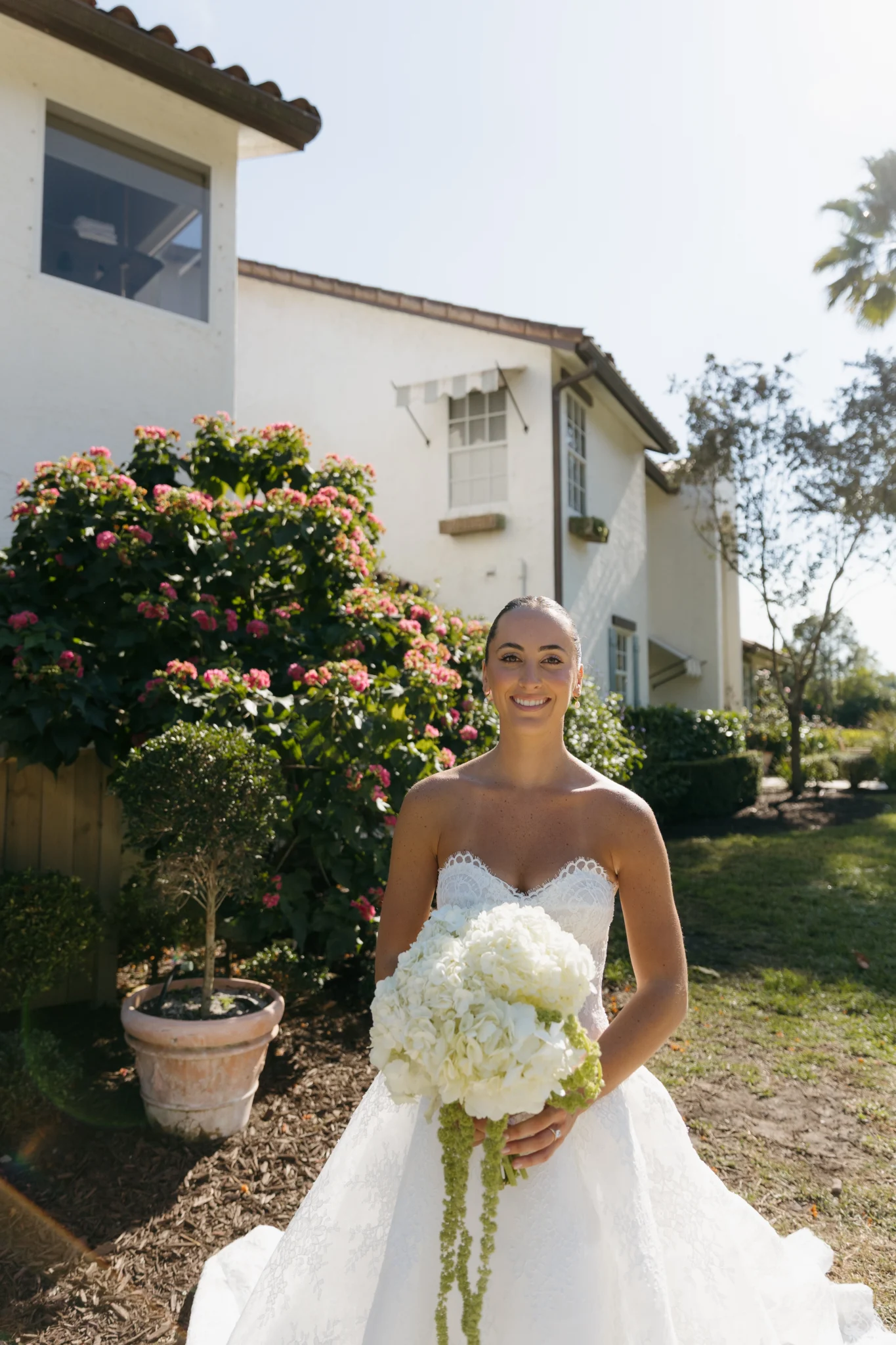 bride in her outdoor venue, wearing natural makeup for weddings