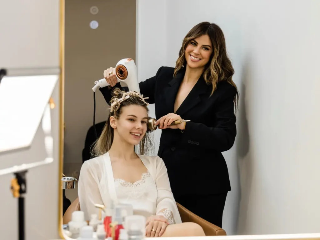 Jess Bonilla installing bridal hair extensions 