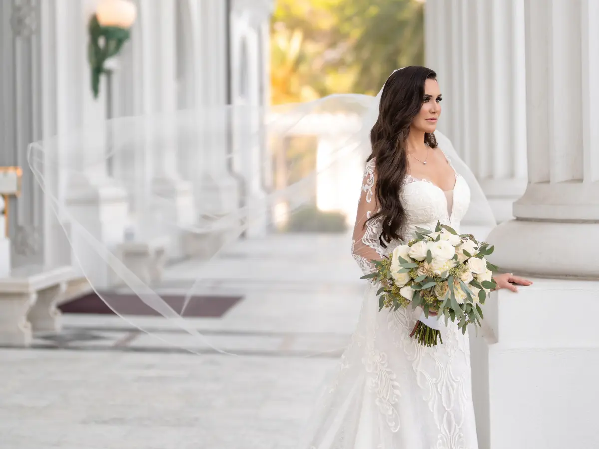 Bride styled for a humid South Florida wedding at Henry Morrison Flagler Museum in Palm Beach